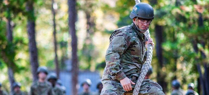 Trainees with the 197th Infantry Brigade complete the Sand Hill Confidence Course at Fort Benning, Ga., on November 16, 2021. U.S. Army / Patrick A. Albright 
