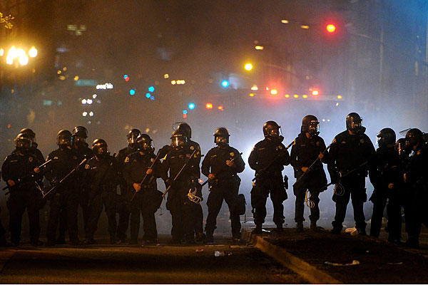 image source: https://www.csmonitor.com/var/ezflow_site/storage/images/media/images/1104-oakland-police-occupy.jpg/10922644-1-eng-US/1104-Oakland-police-Occupy.jpg_full_600.jpg