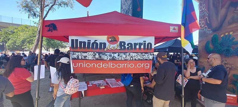 Union del Barrio information booth - Photo NNOMY 2023